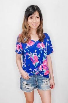 Royal Blue Floral Easy Tee - Lavender Latte Boutique Trendy Floral Print T-shirt For Day Out, Blue V-neck T-shirt For Spring, Cute V-neck T-shirt For Spring, Trendy Blue Floral Print T-shirt, Cute Floral Print V-neck Top, Cute V-neck Floral Print Tops, Casual T-shirt With Floral Print For Day Out, Blue Floral Print Short Sleeve Tops, Blue Floral Print V-neck Top