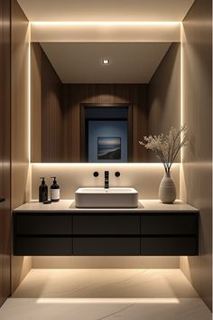 Modern bathroom vanity with recessed and under-cabinet lighting How To Design Bathroom, Modern Vanities Bathroom, Under Vanity Lighting, Smallest Bathroom Ideas, Bathroom Cabinet Lighting, Bathroom Floating Vanity Ideas, Half Bathroom Inspiration, Vanity Ideas Bathroom, Woodland Bathroom