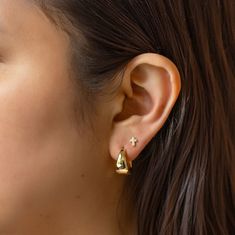 These statement small hoops feature a unique teardrop silhouette, adding a feminine twist to a bold look. Elevate your style and make a statement with these luxurious gold vermeil hoop earrings. Gold Vermeil Inside Diameter 0.5in(13mm), Width 0.3in(8mm) Click closure E190-13G Moms Bracelet, Choker Pendant, Yellow Gemstones, Studded Necklace, Gold Statement Ring, Hoop Earrings Gold, Nose Jewelry, Red Gemstones, Engraved Bracelet