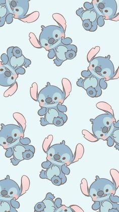 a blue and pink wallpaper with many small stuffed animals on it's sides