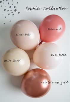 four balloons with names on them sitting next to each other