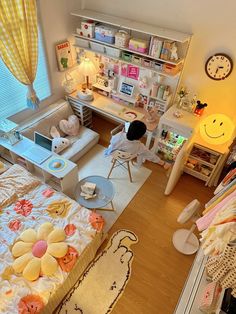 a child's bedroom is decorated in pastel colors and features a desk, bookshelf, bed, and toys