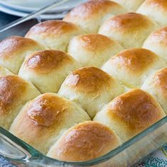 a casserole dish with rolls in it