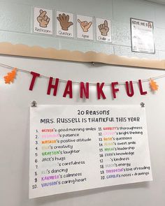 a sign that says thank you all for thanksgiving and is hanging on the wall in front of a bulletin board