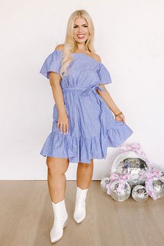 Plus Size - You are sure to look simply supreme in this stunning sky blue dress featuring lightweight breezy material patterned with white accent stripes, a straight elastic neckline with short sleeves that can be worn on or off the shoulder, a tie belt waistline, and a flattering silhouette that falls into a peplum bottom with an uneven knee-length hemline! Measurements 1XL : Bust 36", Hip 40", Length 34", Sleeve Length 7.5", Waist 28-32". 2XL : Bust 38", Hip 42", Length 34.5", Sleeve Length 8" Casual Light Blue Knee-length Denim Dress, Light Blue Knee-length Denim Dress, Light Blue Cotton Denim Knee-length Dress, Knee-length Light Blue Cotton Denim Dress, Sky Blue Dress, Faux Suede Boots, Swimsuit Sale, Stripe Dress, White Accents