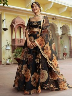 Introducing the beautiful black floral printed organza event wear lehenga choli, the perfect outfit for festivals, events, and receptions. This stunning black lehenga is made from high-quality organza tebi material, adorned with exquisite floral printed work. Its elegant design and intricate details make it a must-have for any special occasion.
The lehenga features a semi-stitched design, allowing for a comfortable fit of up to 42 inches. With a 4.0-meter flair, it exudes grace and elegance with Floral Lengha, Golden Lehenga, Lehenga Choli Designs, Western Gown, Indo Western Gown, Lehenga Choli For Women, Choli For Women, Printed Organza, Black Lehenga