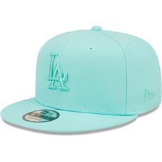 Ensure your Los Angeles Dodgers pride is unquestionable with this trendy Color Pack 9FIFTY snapback from New Era. Built with a high crown and flat bill, this cap offers street-ready, trendy appeal. While the Los Angeles Dodgers embroidery enhances your spirit, the pastel colorway brings a fresh breath of Spring to your collection. Ny Yankees Hat, Yankee Hat, New York Yankees Baseball, Nfl Football Teams, New Era Hat, New Era Fitted, Yankees Baseball, Spring Color, Blue Hat