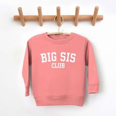 Looking for a cute sweatshirt for your kids? We have the perfect Big Sis Club graphic sweatshirt addition to their closet! Also available in youth sweatshirts. School Crew Neck Sweatshirt With Name Print, Pink Graphic Print Sweatshirt For School, Cotton Letter Print Sweatshirt, Cute Letter Print Sweatshirt For School, Long Sleeve Sweatshirt With Text Print For School, Crew Neck Sweatshirt With Screen Print For School, Long Sleeve Sweatshirt With Screen Print For School, Heart Of Gold Quotes, Big Sis