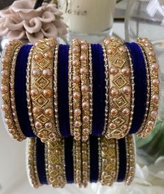 Indian Bangles Jewellery Metal Broad Kangan Karwachauth Navrati Bollywood Weddings Eid Diwali Parties. ➡️ Budget Collection-- our Budget collection is more focused on looks and easy on the pocket. The quality front is slightly compromised, Bangles might have imperfections but all in all look of the set is not bad.. or so we think  ⭐️ We often put videos and more images of these items on our Instagram page, please have a look  https://www.instagram.com/tohfaa_london/ Sizes - 2.4/2.6/2.8/2.10 2.4 is 2.25 inches 2.6 is 2.37 inches 2.8 is 2.5 inches 2.10 is 2.62 inches Other designs available please check my other listings! Material - Velvet Metal Bangles, Kundan, champagne coloured pearls, Rhinestone. Set is for two hands. 13 bangles in each hand. Total 26 bangles in the set including Kangans Embroidered Bangle Jewelry For Wedding, Embroidered Bangle For Wedding, Traditional Embroidered Bracelets For Wedding, Traditional Embroidered Bracelet For Wedding, Embroidered Bracelets For Wedding And Festivals, Gold Embroidered Bangle Bracelet, Gold Embroidered Bracelets For Wedding, Bollywood Embroidered Jewelry For Party, Bollywood Embroidered Party Jewelry