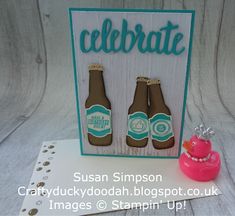 a card with two beer bottles and a rubber duck