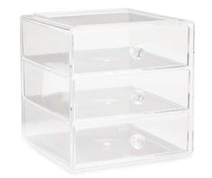 three drawers are stacked on top of each other in clear acrylic storage boxes