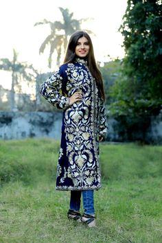 Get a polished look with this jacket. Pair it up with a skirt, trousers, dress or even a flowing maxi and be ready in style.Product Details- Condition: Brand New (made to order)- Style: Coat- Fabric: Art Raw Silk/Pure Raw Silk/Wool or Velvet- Embroidery: Kashmiri Aari Embroidery- Base Color: Navy Blue- Embroidery Color: Multi-Color- Fully Lined from Inside- Features Pockets on both sides- Length: 42" (107 cm approx) | Can be customized- Care Instructions: Dry Clean Only**If you want the coat to Bollywood Style Outerwear With Chikankari Embroidery For Wedding, Blue Embroidered Long Sleeve Sherwani, Blue Bandhgala With Floral Embroidery And Long Sleeves, Festive Embroidered Long Coat Outerwear, Blue Long Sleeve Sherwani With Floral Embroidery, Blue Long Sleeve Outerwear With Intricate Embroidery, Blue Floral Embroidered Outerwear For Wedding, Festive Multicolor Embroidered Outerwear For Wedding, Festive Embroidered Long Coat