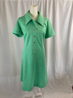 Vintage 1960's lime green shift dress with collar.  Women's size L/XL.  Great condition, no issues as shown in photos. Vintage Green Dress For Work, Retro Green Dress For Work, Retro Green Dress With Buttons, Green Workwear Dress With Placket, Green Dress With Placket For Work, Vintage Green Collared Dress, Retro Collared Formal Dress, Fitted Collared Mod Dress, Fitted Mod Dress With Collar