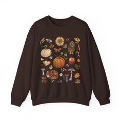 COZY AUTUMN Sweatshirt, COTTAGECORE Sweater with Pumpkin Autumn Leaves Apple Pie Owl Fox Butterflies Mushrooms & Berries, Thanksgiving Shirt, Nature inspired Botanical Crewneck Sweatshirt, Comfy Fall Clothing  Get ready to be obsessed with your new favorite sweatshirt. This beautiful autumn sweatshirt is so cozy and brings all those cottagecore vibes!  Ideal for any situation, this Pumpkin Patch Sweatshirt is warm and comfy. These garments are made from polyester and cotton. This combination helps designs come out looking fresh and beautiful. The collar is ribbed knit, so it retains its shape even after washing. There are no itchy side seams on these pullovers. Stay beautiful! Dress like it's your day!   Make sure to attach 10% discount on your first order with Etsy coupon Welcome10 🍁 Che Cottagecore Fall, Cottagecore Sweater, Thanksgiving Sweatshirt, Pumpkin Autumn, Botanical Shirt, Crewneck Design, Nature Shirts, Cozy Autumn, Fall Sweater