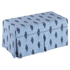 a blue and white box with black designs on it