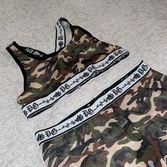 Two Piece Set. Bike Shorts With A Racer Back Bra Top. Size Medium New, Never Worn. See-Through Material, Can Be Worn Over A Bikini. Camo Print With Elasticized Waist Bands. Black Bodysuit Costume, Cake Costume, Plastic Skirt, Sailor Moon Costume, Tube Top And Shorts, Nun Costume, Moon Costume, Racer Back Bra, Bodysuit Costume