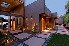 Warm luxury modern desert architecture & chic landscaping with native plants, gravel & flagstones. Movie Theater Backyard, Modern Stairway, Unique Stairs, Restaurant Building, Desert Architecture, Indoor Flooring, Backyard Swimming Pool, Gravel Landscaping