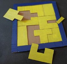 some yellow and blue pieces of construction paper