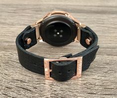 High Quality Grain Genuine Leather Strap Band Compatible with : Galaxy Watch (42mm) | Galaxy Watch Active | Watch Active2 (40mm) | Watch Active2 (44mm) | Adjustable Size Bracelet Perfectly Tailored to Fit Your Wrist. Dressy Style Rose Gold & Black Leather Watch Strap Band. Designed And Handmade by Simeon D Jewelry. The Bracelet is Super Easy to Install on Your Watch. Comes with 4pcs 20mm Quick Release Pins. Please Measure Your Wrist Before Submitting Your Order! Samsung Watch Is NOT Included Black Watch With Bracelet Strap For Everyday Use, Black Everyday Watch With Bracelet Strap, Luxury Black Watch Band For Everyday Use, Everyday Black Watch With Bracelet Strap, Black Round Watch With Bracelet Strap, Black Round Bracelet Strap Watch, Gold Galaxy, Tech Jewelry, Samsung Watch