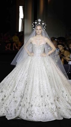 ZUHAIR MURAD on Instagram: "The ZUHAIR MURAD bride gracefully steps in a strapless gown adorned with gold and silver beads compelling a pearled ivory vision. ZUHAIR MURAD Fall-Winter 2022/23 Couture collection. See all the looks at zuhairmurad.com. #ZMCouture #ZMBride #LesArtsDivinatoires" Zuhair Murad Bridal, Nontraditional Wedding Dress, Zuhair Murad Haute Couture, Night Gown Dress, Bridal Elegance, Tony Ward, Gareth Pugh, Haute Couture Dresses, Lela Rose