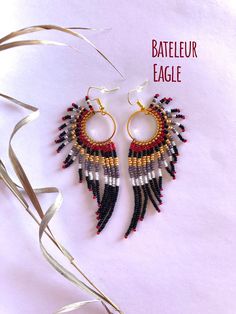 two pairs of beaded earrings on top of each other