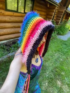 This rainbow festival hood uses a variety of textured fibres for a unique and cozy #ravedaycrochet accessory!  ✨ one of a kind ✨ oversized, fits small-large.  ✨ artificial fibres, black faux fur ✨ uses scrap yarn! Pattern: Festy Oversized Hood by @starlilycreations Handmade with love by Miran in Qathet, BC.  Feel free to message me if you have any questions! Crochet Hooded Cowl, Hood Crochet, Sparkly Halloween, Rainbow Festival, Cat Eared Beanie, Crochet Festival, Scrap Yarn, Crochet Crop Top, Black Faux Fur