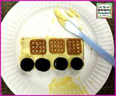 a paper plate with some waffles shaped like a train