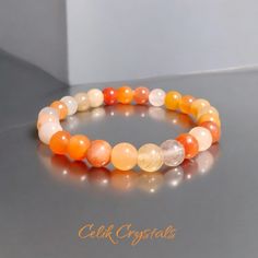 I Can Make This Bracelet In 6.5 To 8.5 Inches If You Send Me A Message. Standard Length Is 7.5 Inches. -This Bracelet Is A Stunning Piece Of Jewelry That Features An Orange And White Color Scheme. The Unique Design Of The Bracelet Allows For Each Bead To Have Many Shades Of Orange And White Colors, Making It A One-Of-A-Kind Accessory. -The Bracelet Is Designed To Fit Both Women And Men, With 5 Different Sizes Available Ranging From 6.5 To 8.5 Inches. The Strong Stretchy Elastic Ensures A Comfort Orange Quartz, Blue Gemstone Bracelet, Pandora Blue, Orange Bracelet, Message Bracelet, Metal Cuff Bracelet, Beads Bracelet Design, Rhinestone Cross, Bracelet Design