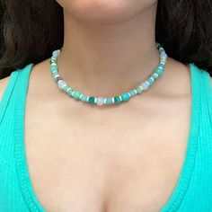 This Is A Handmade Aqua Blue And Green Necklace. This Is Made Out Of Various Shades Of Blue/Green. This Is On A Necklace Wire Accompanied By A Clasp. The Measurement For This Necklace Is 15 Inches, But Message Me For Any Size Customizations. #Beach #Necklace #Handmade #Beadednecklace #Beads Casual Turquoise Beaded Necklaces With Colorful Beads, Casual Turquoise Beaded Necklace With Colorful Beads, Casual Turquoise Beaded Necklaces, Casual Turquoise Beaded Necklace, Trendy Turquoise Beaded Necklaces With Round Beads, Trendy Turquoise Round Beaded Necklace, Summer Blue Beaded Necklaces With Faceted Beads, Blue Beaded Necklaces With Faceted Beads For Summer, Summer Blue Necklaces With Faceted Beads