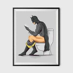 a batman sitting on top of a toilet