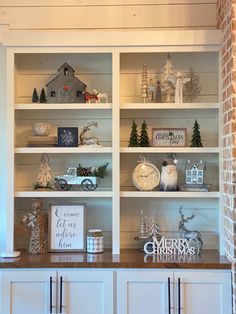 the shelves are decorated with christmas decorations