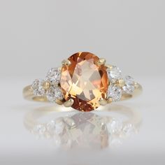 Don't miss this opportunity to own this beautiful gemstone ring! => Gemstone Type - Citrine, Clear Quartz => Gemstone Cut - Faceted => Gemstone Size - 8*10 mm, 3 mm => Total Number of Gemstones - 7 => Metal Type - 14k Gold Filled (Tarnish Resistant and Nickel Free) - also available in 925 sterling silver and 14k solid gold * Please contact me for pricing on sizes larger than 11 * ~ Feel free to ask me about custom made designs. ❏ Replacements and custom orders: ✪ 925 sterling silver - no additio Orange Topaz Rings For Anniversary, Orange Topaz Promise Rings, Anniversary Orange Topaz Rings, Orange Topaz Wedding Ring With Center Stone, Heirloom Topaz Ring For Promise, Orange Prong Setting Ring For Promise, Anniversary Orange Topaz Ring With Accent Stones, Orange Promise Ring With Prong Setting, Citrine Gemstone Wedding Ring