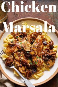 chicken marsala on a plate with a fork