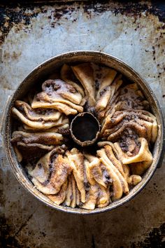 a pan filled with food on top of a table