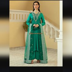 A Breathtakingly Beautiful Ensemble From Vanya. Pk Fabric: Korean Silk Dupatta Fabric: Organza Chest Size: 40" Color: Green Bollywood Style Green Dress For Eid, Green Bollywood Dress For Eid, Green Unstitched Dress With Dabka Work, Green Unstitched Dress For Eid, Eid Anarkali V-neck Dress, Green Long Sleeve Festive Dress, Green Georgette Dress With Dabka Detailing, Green Unstitched Dress For Wedding, Green Georgette Dress With Dabka Embroidery