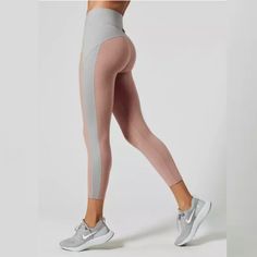 The Michi Lotus Crop Legging Boasts Understated Style For In And Out Of The Studio. This Cropped Legging Features A Colorblock Hue, With Strategically Placed Panels, And A High Rise Waistband, Giving You Low-Key Style And A Flattering Fit. Made Of A Smooth Performance Fabric, With Moisture Wicking, 8-Way Stretch, And A Wide Supportive Waistband. This Legging Is Ideal For Yoga, Spinning, Gym Sessions, And More. Cropped High Rise Slip On Fitted Unlined 48% Nylon, 39% Polyester, 13% Spandex Poses Art, Fashion Thoughts, Outfits Athletic, Outfit Gym, Gym Fashion, Great Pic, Workout Attire, Activewear Fashion, Womens Capris