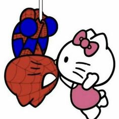 a hello kitty hanging upside down from the ceiling with a heart shaped object in front of it