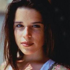 a close up of a person with long hair