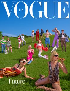 people are sitting on the grass in front of a blue sky and there is a magazine cover