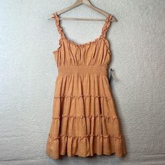 Nwt City Studio Womens Orange Sleeveless Ruffled Tiered Dress Juniors Xl Sleeveless, Ruffled At The Shoulders And At The Neck; Soft; Flowing; Tiered Skirt With Elastic Waistband. Fully Lined. Has Stretch New With Tags Retail $59 Approx Measurements: Chest (Pit To Pit Is Half): 34" Length: 35" Clt02056781satewrhh-4/24 B-Mm2 #Womens #Clothing #Wardrobe #Basics #Womensclothing #Nwt #Nwot #Guc #Euc 14 Oz Lined Sundress With Ruffled Straps, Sundress With Ruffled Straps For Day Out, Sleeveless Cotton Mini Dress With Ruffles, Casual Sleeveless Dress With Ruffled Straps For Brunch, Casual Ruffle Sleeveless Dress For Vacation, Casual Sleeveless Dress With Ruffled Straps For Day Out, Sleeveless Cotton Ruched Mini Dress, Vacation Sleeveless Dress With Ruffled Straps, Brunch Sleeveless Dress With Ruffled Hem And Straps