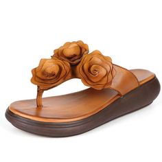 • Upper Material: Genuine Leather• Sole Material: TPR• Item Type: Slippers• Heel Height: Low (1cm-3cm)• Platform height: 0-3cm• Fit: Fits true to size, take your normal size• Insole material: PU• Pattern Type: Floral• Summer season• Lining Material: Polyurethane• Item # N634• Width Options: B - Medium  • Shipping World Brown Toe Post Wedge Sandals For Spring, Spring Casual Wedge Sandals With Single Toe Strap, Brown Single Toe Strap Slippers For Spring, Casual Single Toe Strap Wedge Sandals For Spring, Comfortable Brown Flip Flops For Spring, Brown Flip Flops For Spring, Adjustable Brown Slippers For Spring, Summer Toe Post Wedge Sandals With Leather Footbed, Leather Footbed Toe Post Wedge Sandals For Summer