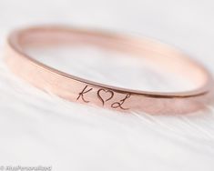 Minimalist wedding band , womens wedding band engraved with your desired initials symbols or words... 14k solid rose gold ring will stay with you forever in same condition.Express your unique and elegant style with your wedding band ♡ Also makes a perfect personalized gift for her...We design this engraved ring as a simple but stylish piece which can match perfectly with other jewelry. Please let us know if you want any custom requests for this wedding ring. ► FEATURES; Band width: 2mm Material Initial Engraved Ring, Rose Gold Promise Jewelry With Initials, Rose Gold Jewelry With Initials For Promise, Rose Gold Initial Ring With Round Band For Anniversary, Rose Gold Initial Ring For Anniversary, Engraved Initials Promise Ring In Rose Gold, Rose Gold 14k Stamped Initial Promise Ring, Anniversary Rose Gold Initial Ring With Round Band, Cheap Rose Gold Engraved Wedding Ring