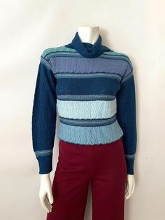 Teal Vintage Sweater, Blue Retro Knit Tops, Retro Blue Knit Top, Retro Blue Knitted Sweater, Blue Jacquard Knit Tops, Blue Knit Turtleneck Sweater, Fitted Blue Turtleneck Sweater, Blue Fitted Turtleneck Sweater, Blue Jacquard Knit Sweater