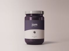 a jar of jam on a white and purple background