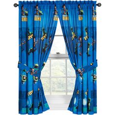 the curtains are blue and have cartoon characters on them