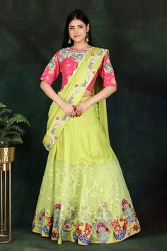 Parrot green lehenga saree with floral and thread hand embroidered pallu. Comes with a magenta padded blouse and a petticoat with an attached cancan. - Aza Fashions Parrot Green Lehenga, Petticoat Pattern, Parrot Green, Green Lehenga, Padded Blouse, Lehenga Saree, Blouse For Women, Saree With Blouse, Green Silk