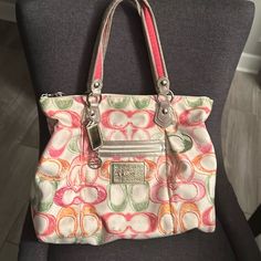 Rare! Coach Multicolored Tote Bag. Material Has Coach Logo In Bright Fun Colors. Great Condition. Pink Coach Bag With Zipper Closure, Coach Pink Tote Satchel, Pink Coach Tote Satchel, Multicolor Coach Bag With Zipper Closure, Pink Pouch Bag With Handle Drop, Coach Logo, Bags Coach, Womens Tote Bags, Coach Bags