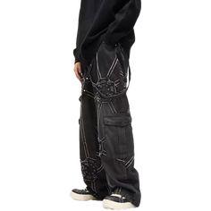 Make a bold statement with our Spider Web Cargo Jeans. These unique black denim pants feature an eye-catching spider web design embroidered in contrasting white thread. The edgy gothic aesthetic is enhanced by strategically placed studs and distressed details. With a relaxed fit and practical cargo pockets, these jeans combine style with functionality. Perfect for those who love alternative fashion, they're ideal for concerts, festivals, or creating a standout street-style look. Distressed Emo Bottoms For Streetwear, Distressed Emo Style Streetwear Bottoms, Black Distressed Gothic Bottoms, Gothic Black Distressed Bottoms, Edgy Black Distressed Pants, Punk Jeans For Halloween Streetwear, Punk Halloween Jeans For Streetwear, Black Jeans For Halloween Streetwear, Emo Style Pants For Halloween Streetwear