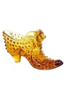 This Fenton Art Glass Amber Hobnail Shoe Slipper with Cat Head is a beautiful and unique decorative piece for any collection. The shoe is made of high-quality glass and features a stunning hobnail pattern in a rich amber color. The cat head adds a touch of whimsy and art to the design. Crafted in the United States during the 1970s, this shoe slipper showcases the production style and techniques of Fenton. Its decorative features make it a perfect addition to any pottery and glass collection, and it is sure to be a conversation starter in any room. Add this charming shoe slipper to your collection today! Condition is used but excellent. Measures 5.5" approximately. Shipped with USPS. Strange Shoes, Fun Art, Amber Color, Collectible Figurines, Glass Collection, Art Glass, Labour Day, Glass Art, Cool Art