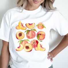 Peach Trendy Crewneck cottagecore shirt Graphic Tees For Women fruit tshirt comfort colors gift for foodie Trending Fruit Shirt Please message us if you want your t-shirt in one of the additional colors or a sweatshirt.  Comfort Colors garment-dyed t-shirt made 100% with ring-spun cotton. The soft-washed, garment-dyed fabric brings extra coziness to your wardrobe while the relaxed fit makes it an excellent daily choice.  Please keep in mind that the design is scaled down for smaller t-shirt sizes. T-SHIRT CARE INSTRUCTIONS: Machine wash cold Wash inside-out, with similar colors Tumble dry low. Hang-dry for longer life Cool iron inside-out. Do not use bleach Do not iron directly on the print Do not dry-clean Thank you for supporting our small business! Please visit our shop https://www.etsy Peaches Graphic, Y2k Style Aesthetic, Fruit Clothing, Gothic Baby, Fruit Shirt, Punk T Shirt, Baby Graphic Tees, Y2k Baby Tee, Y2k Clothing